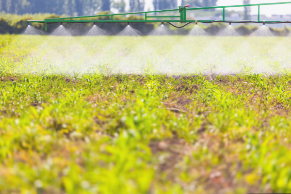 Tractor spraying herbicide / pesticides